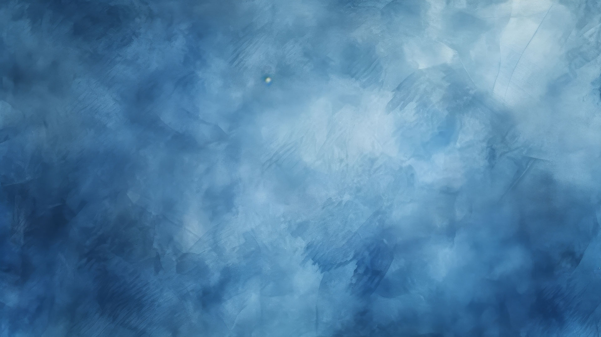 The image shows a textured blue background with a lighter blue area on the right, possibly representing water or sky, and a darker blue section on the left that could be interpreted as land or another solid surface.